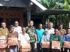 Penyerahan Bantuan Logistik Kepada Warga Terdampak Keracunan Pangan di desa Karangturi, Gantiwarno
